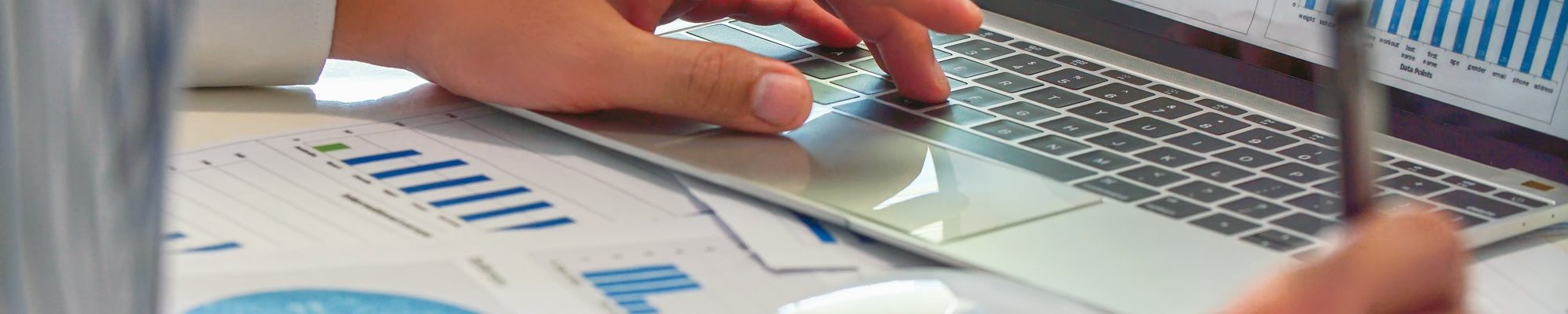 close-up-of-business-people-analysis-charts-and-graphs-of-marketing-on-laptop-and-paperwork close-up-of-business-people-analysis-charts-and-graphs-of-marketing-on-laptop-and-paperwork